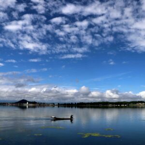 Shinning Dal Lake with glittering Shikara.PIC BY:kashmirmediawatch.com
